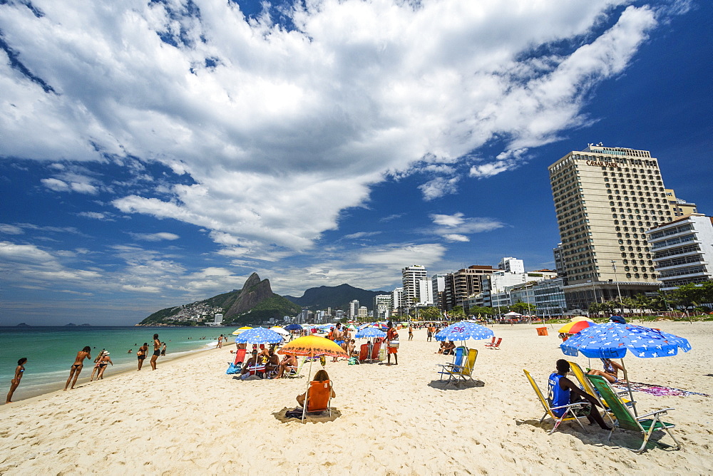 Umbrellas in a sunny Ipanema Beach, south zone of Rio de Janeiro, Brazil