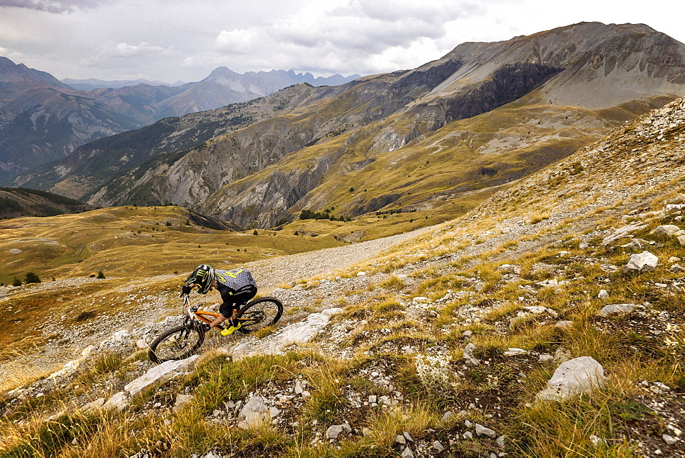 A Mountain Biker In The Backcountry Of Mercantour National Park, France