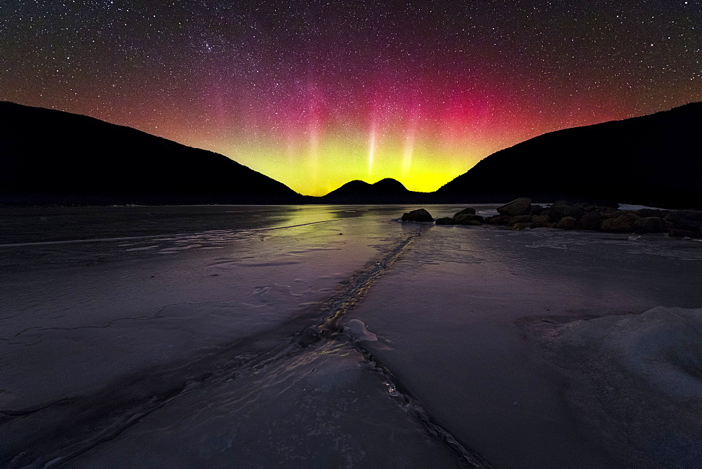 The Northern Lights over frozen Jordan Pond in Acadia National Park.