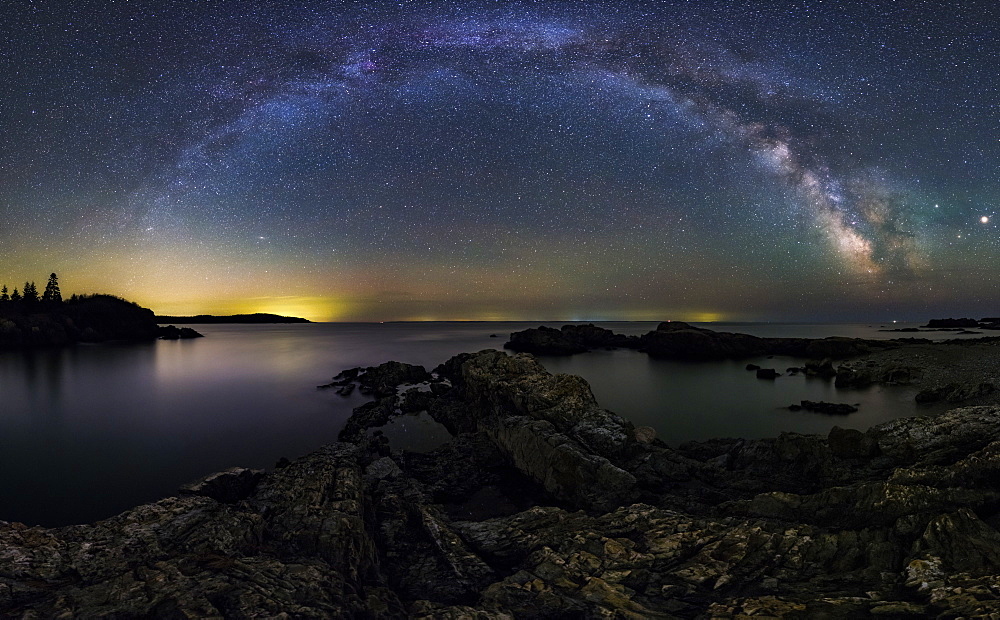 A Milky Way panorama over the ragged coast of Down East Maine.