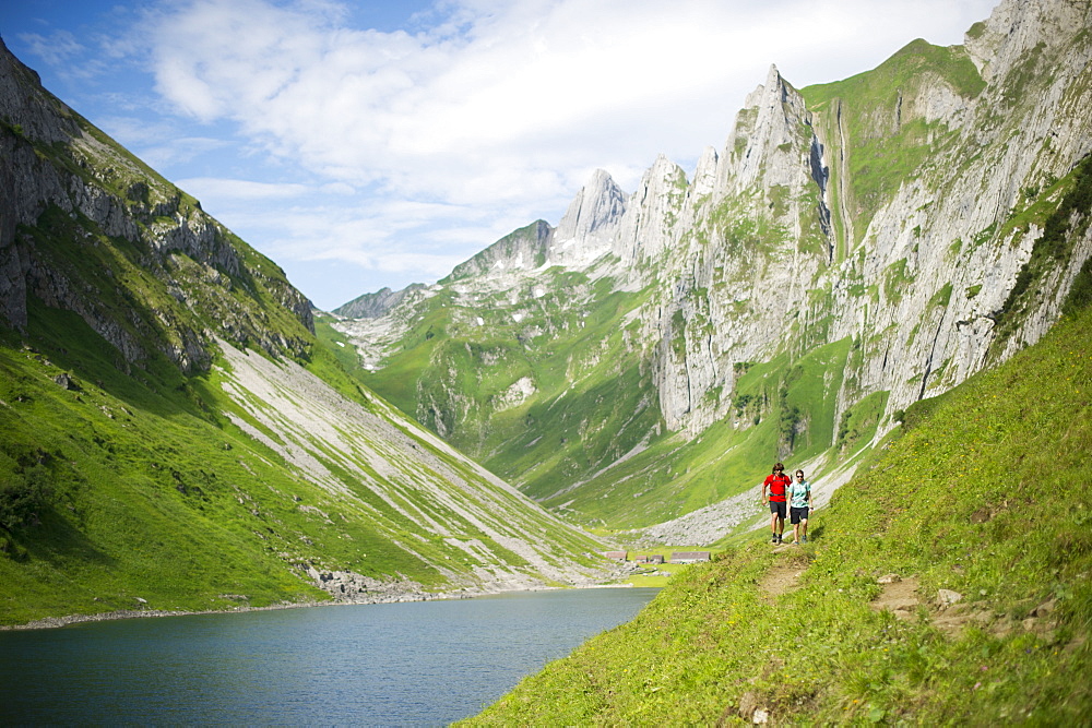 Man and woman hiking in Appenzellerland