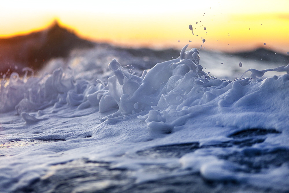 A foam wave captured during sunrise on the east side of Oahu.