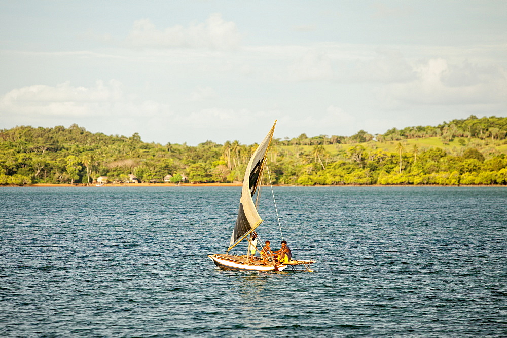 The Louisiade Archipelago is a string of ten larger volcanic islands frequently fringed by coral reefs, and 90 smaller coral islands located 200 km southeast of New Guinea, stretching over more than 160 km and spread over an ocean area of 26,000 km? between the Solomon Sea to the north and the Coral Sea to the south. The aggregate land area of the islands is about 1,790 km? (690 square miles), with Vanatinai (formerly Sudest or Tagula as named by European claimants on Western maps) being the largest. Sideia Island and Basilaki Island lie closest to New Guinea, while Misima, Vanatinai, and Rossel islands lie further east. The archipelago is divided into the Local Level Government (LLG) areas Louisiade Rural (western part, with Misima), and Yaleyamba (western part, with Rossell and Tagula islands. The LLG areas are part of Samarai-Murua District district of Milne Bay. The seat of the Louisiade Rural LLG is Bwagaoia on Misima Island, the population center of the archipelago.