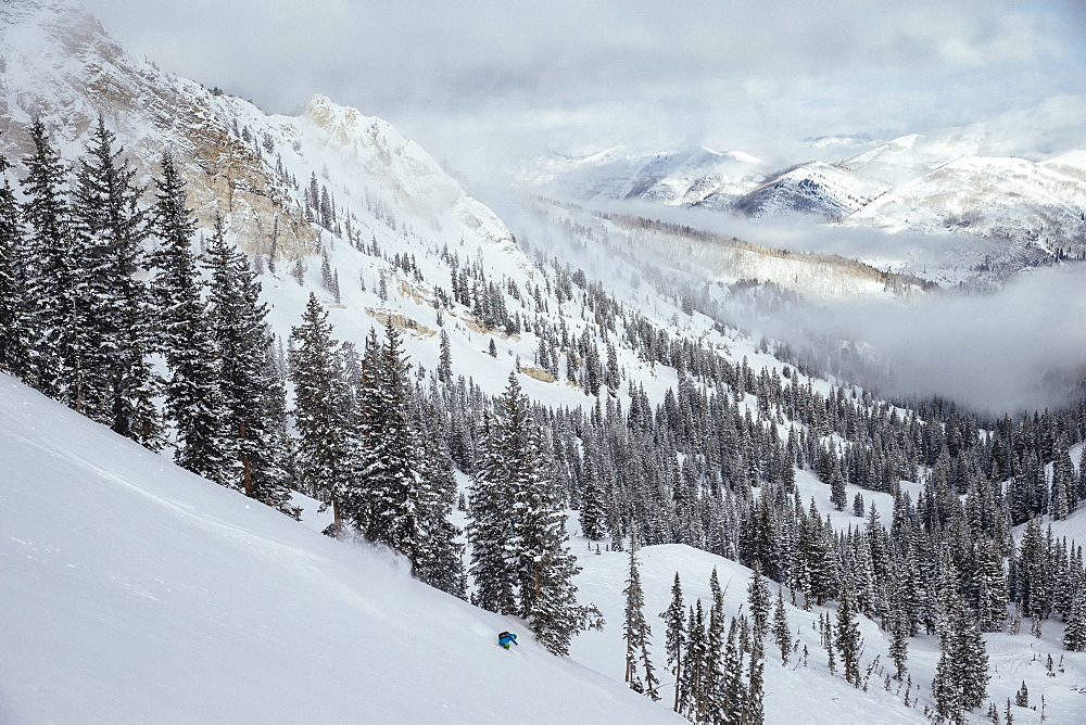 A woman making some fresh turns. Solitude, Utah