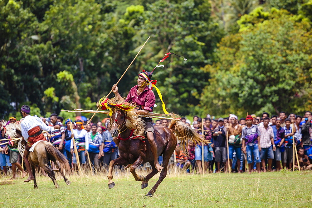 Men on horses competing in Pasola Festival, Sumba island, Indonesia