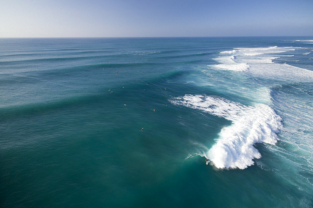 An overview of perfect surf at Sunset Beach, on the north shore of Oahu.