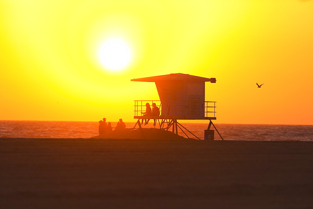 Silhouette of lifeguard tower at Huntington Beach, Orange County, California, USA