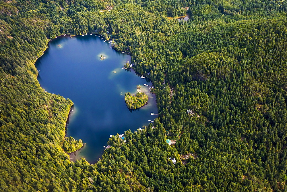 Aerial view of Levette Lake surrounded by forest, Whistler, British Columbia, Canada