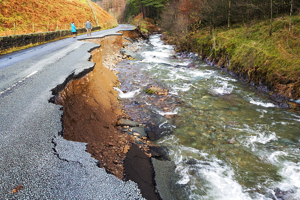 The A591, the main road through the Lake District, completely destroyed by the floods from Storm Desmond, Cumbria, UK. The road was breached in several places by landslides and walls of flood debris twenty feet high. the road will probably be closed for months. Taken on Sunday 6th December 2015.