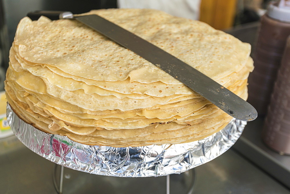 French pancakes or crepes in a crepes stand at food market by the Sacre Coeur, Paris, France