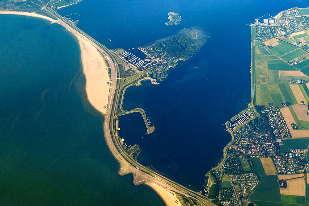 Aerial view of Wadden Sea, city and road across sea, Den Helder, Netherlands