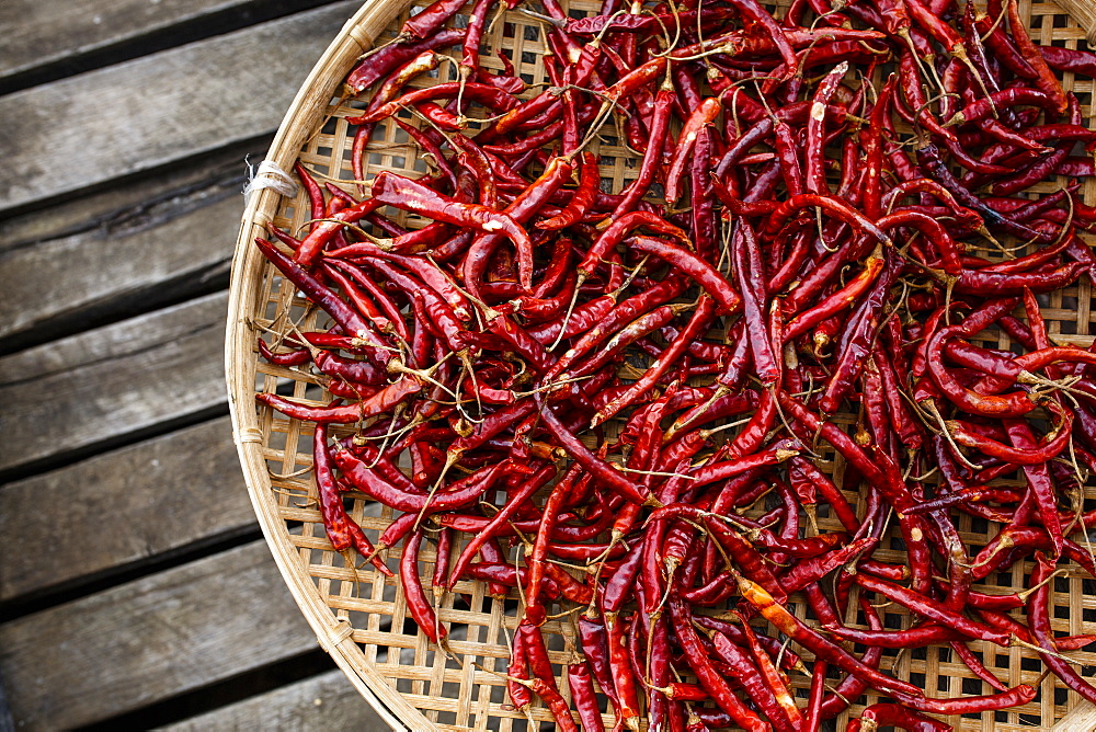 A basket of chilis sits on a dock on Myanmar's Inle Lake, one of the country's most popular tourist destinations