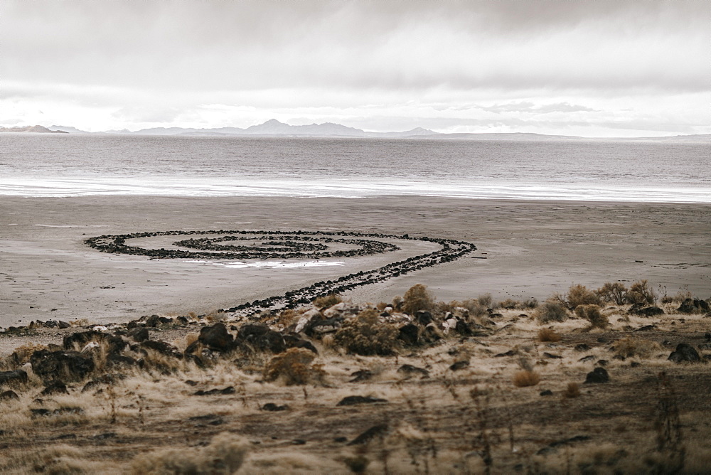 Barren landscape and art named Spiral Jetty designed by Robert Smithson, Spiral Jetty, Utah, USA