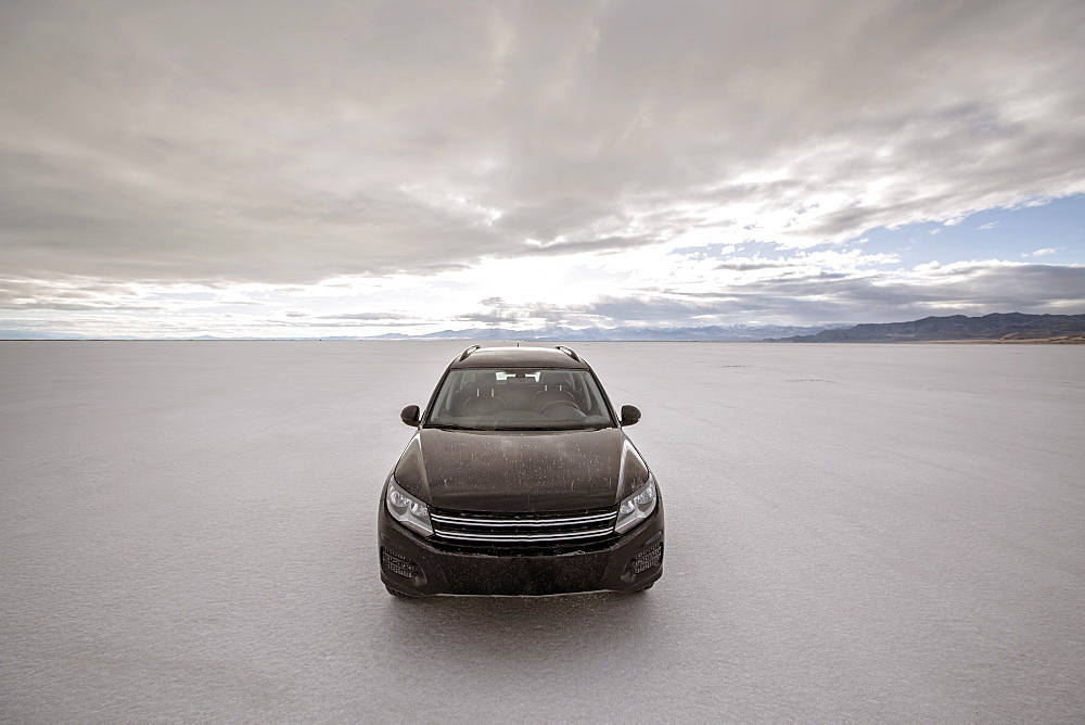 Front view of SUV parked on Bonneville Salt Flats, Wendover, Utah, USA