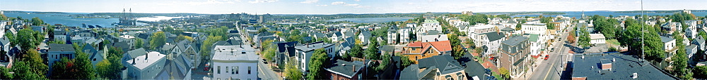 A 360 degree view from the Portland Observatory in Portland, Maine. Built in 1807, the Observatory offers excellent views of Portland, Casco Bay and the White Mountains of New Hampshire. This picture was made with a panoramic camera that rotates as it exposes film.