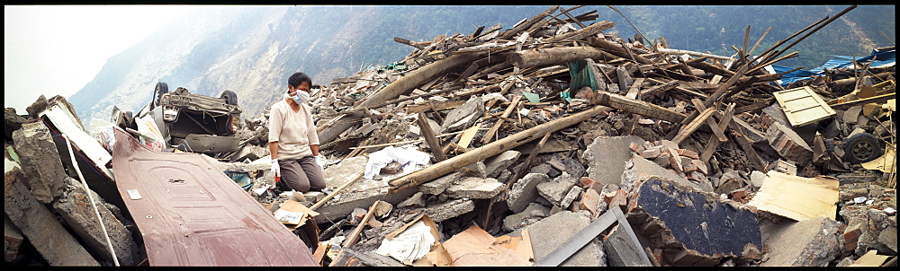 A mother mourns her dead son  May 17 in Beichuan, China. The death toll in China's worst earthquake in 30 years could top 80, 000 according to the government.