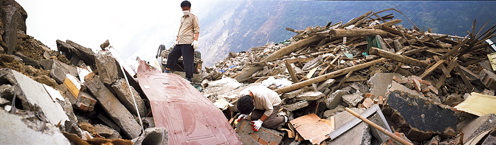 A mother mourns her dead son  May 17 in Beichuan, China. The death toll in China's worst earthquake in 30 years could top 80, 000 according to the government.