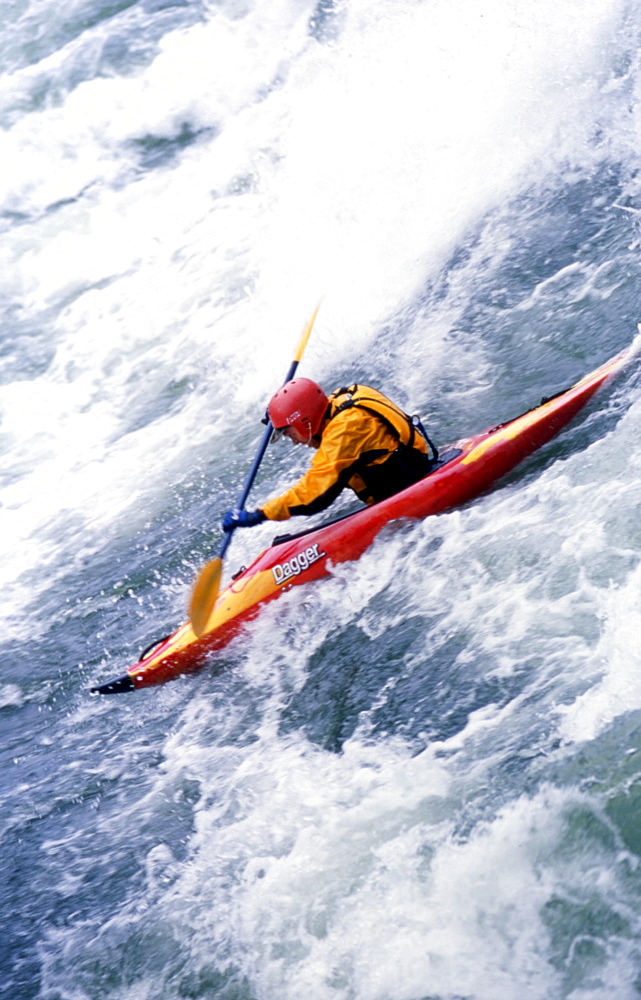 Every year, hardcore whitewater fanatics migrate to the riverside community of Kingfisher, British Columbia to play in the Shuswap River on one of the finest natural standing waves the province has to offer. This collection of images were taken over a hot July weekend during the 2003 Annual Kayak Rodeo competition.