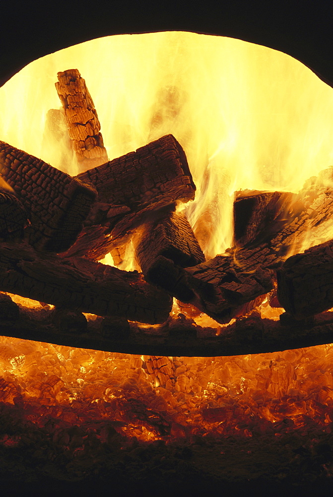 Fire in the pottery kiln, Conner Prairie Living Museum in Fischers, Indiana.