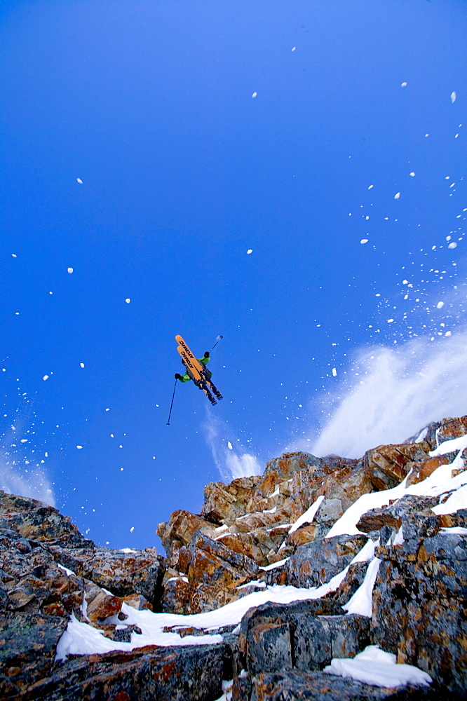 Snow Rains down as Billy lets fly over Devils Castle, Alta Utah