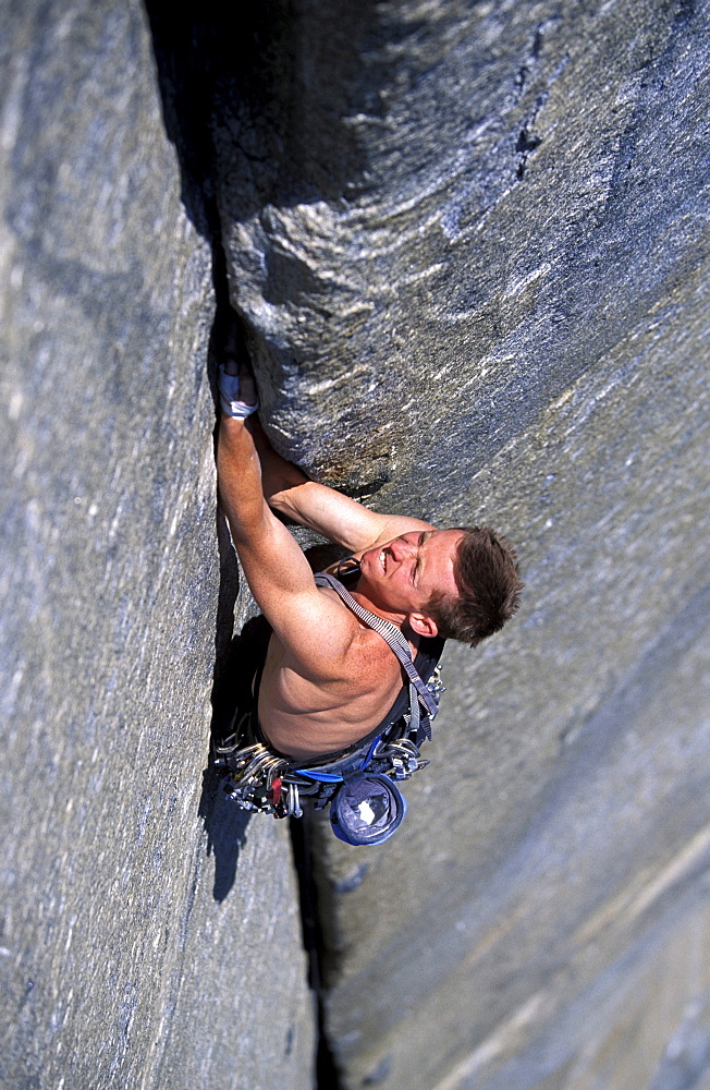 Tommy Caldwell rock climbing on El Capitan in Yosemite National Park, California. In the photo Caldwell is doing the first free accent of The West Buttress of El Capitan. Caldwell is one of the worlds leading climbers.