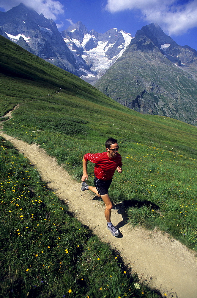 Topher Gaylord trail running in the Lautaret, France.