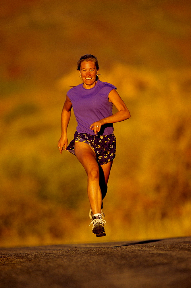 Kady Bodenhemier road running in Moab, Utah.