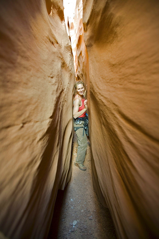 Lara Antonelli descending the main fork of Leprechaun Canyon also known as Shimrock, North Wash, Utah