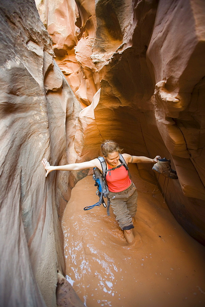 Lara Antonelli descending the main fork of Leprechaun Canyon also known as Shimrock, North Wash, Utah