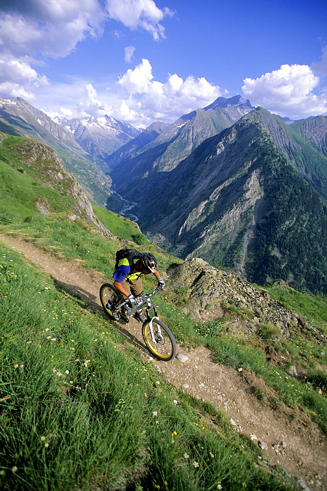 Richie Schley rides his mountain bike on the trails of Les Deux Alpes, France.