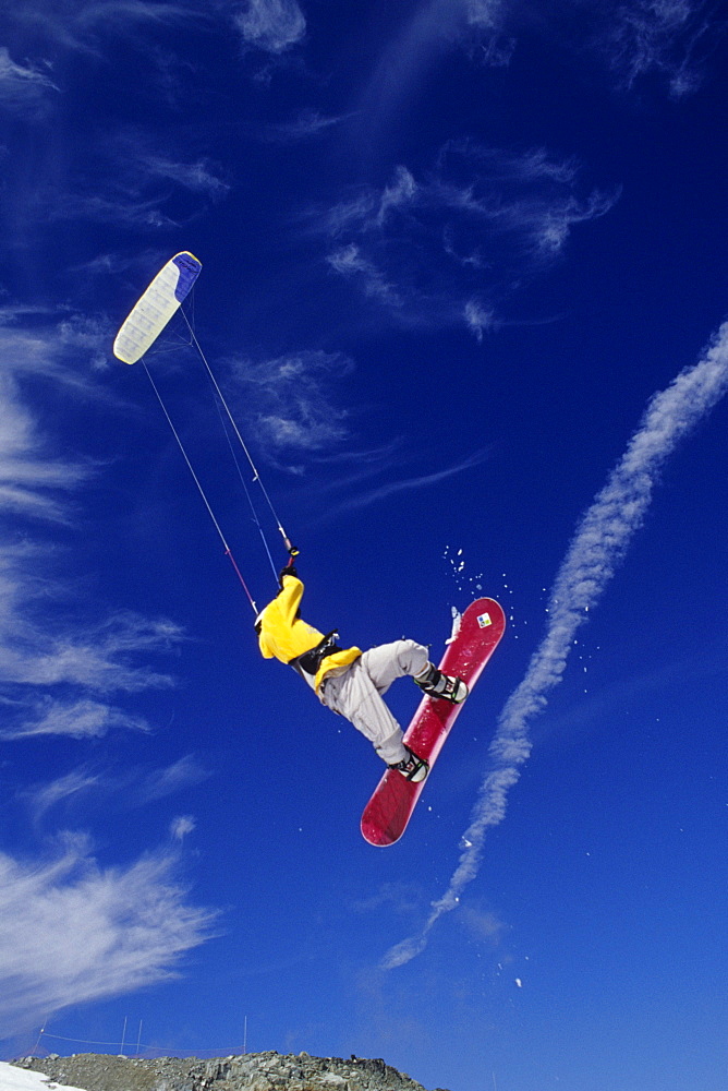 Luk Stanek kiteboarding at Blackcomb Mountain. Whistler, British Columbia, Canada.