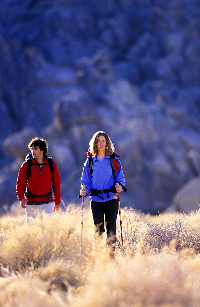 Ashley Loux and Tim Davis enjoy trekking, hiking, backpacking in the high desert outside of Lone Pine in California.