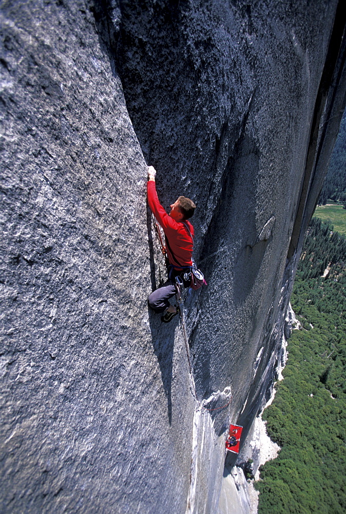 Big wall climber Tommy Caldwell rock climbing Dihedral wall, a multi pitch route on El Capitan in Yosemite National Park, California.