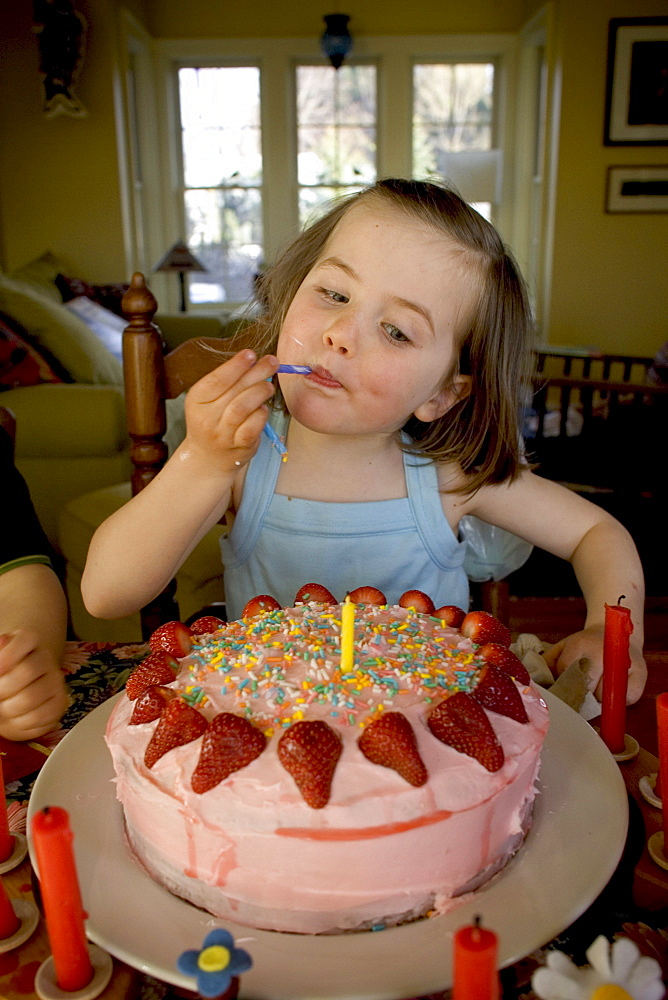 A young girl celebrates her 4th birthday at her home in Yarmouth, Maine.