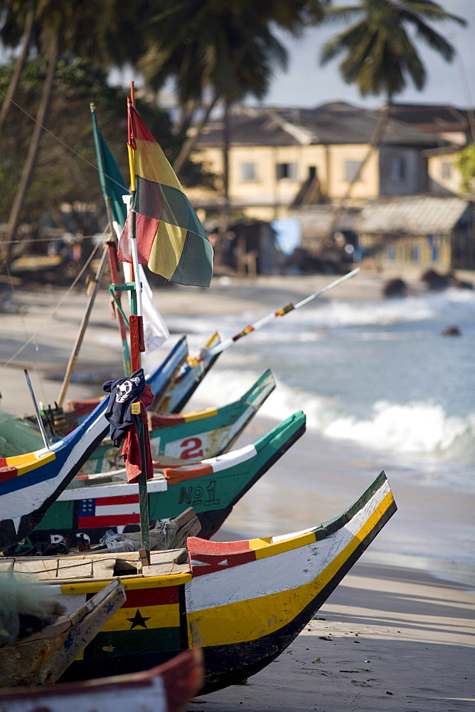 Row of boats on the beach in Elmina