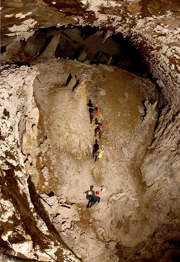 Photograph of a huge underground ramp deep in the heart of the mountain in Mulu National Park.