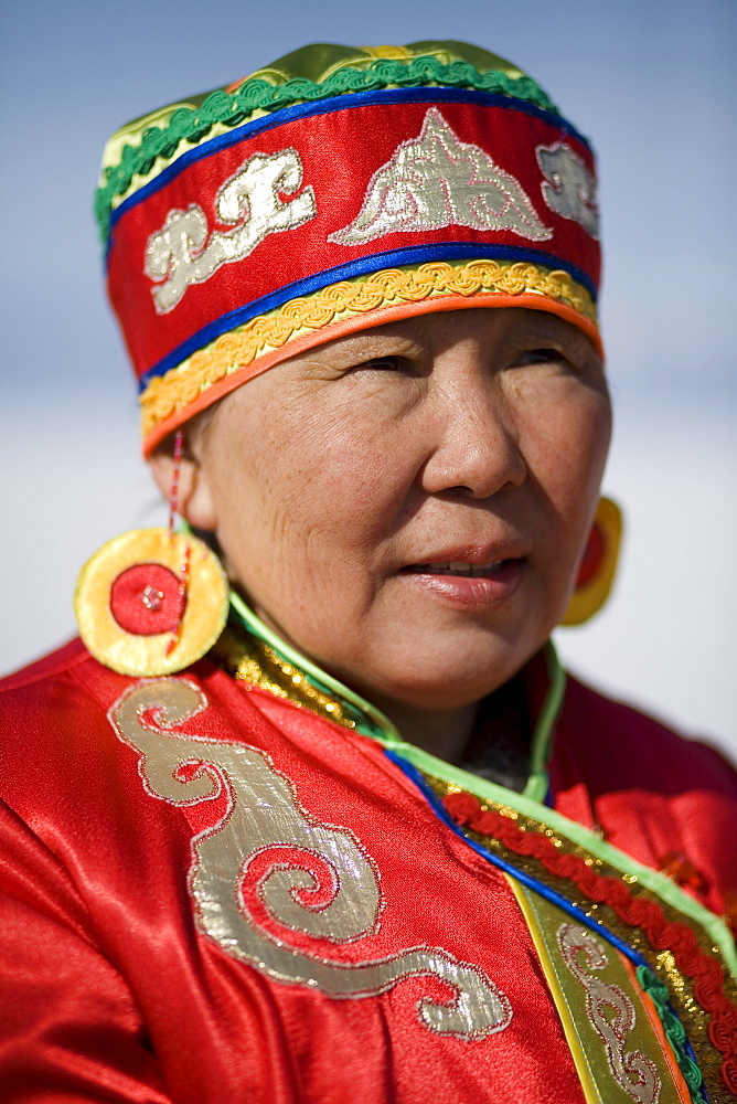 A local Buryat woman involved in a traditional wedding ceremony on Olkhon Island, Siberia, Russia.