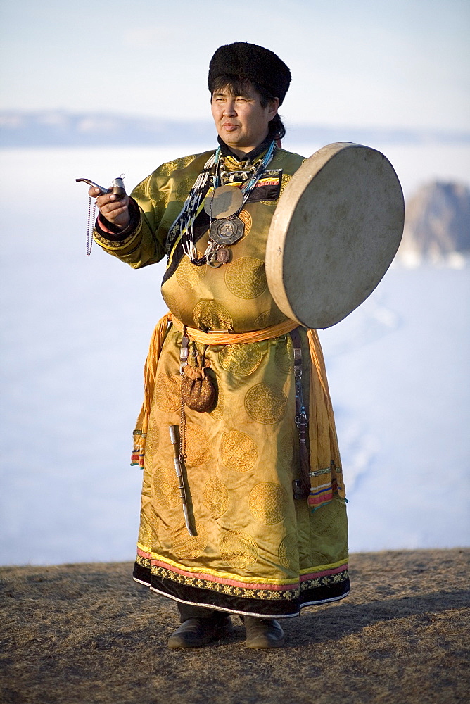 A Shaman performs a ceremonial ritual on Olkhon Island, Siberia, Russia.