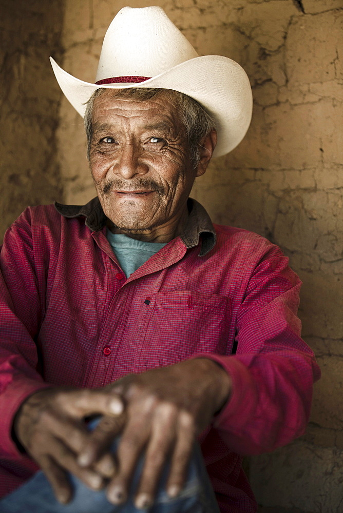 Portrait (headshot) of the tarahumara runner Victoriano Churro at his house in Cerocahui,  Chihuahua,  Mexico. Victoriano was the fisrt tarahumara runner who conquered the Leadvile 100 Trail Run at age 53.