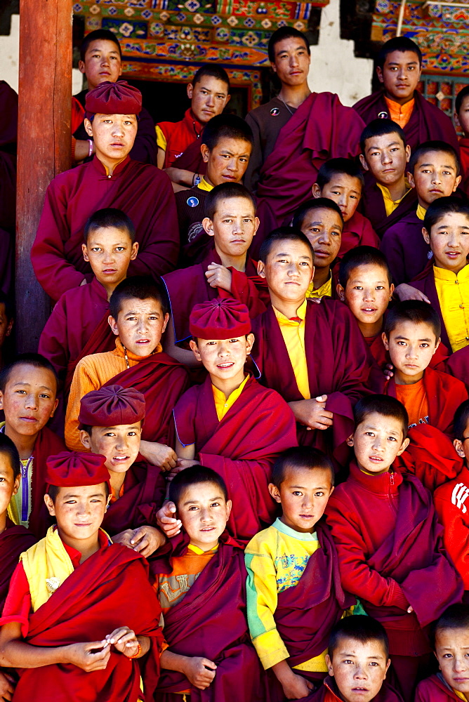 India, Jammu and Kashmir, Ladakh. A group of novice monks pose for a portrait at The Drukpa Kagyud Primary School. The school is part of Hemis Buddhist Monastery located 45 kilometers from Leh in Ladakh, Northern India.