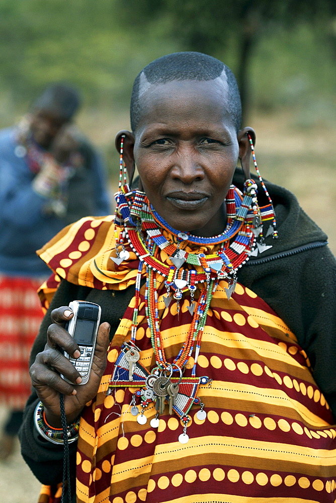 Masai woman with her cell phone.