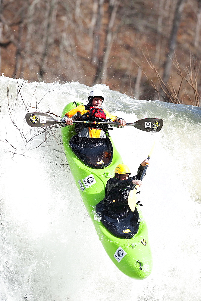 Eric Jackson (top) and his son Dane Jackson run falls in the Dynamic Duo on the Caney Fork in Rock Island, TN.