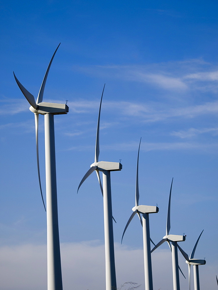 Windmills for electric power at work.