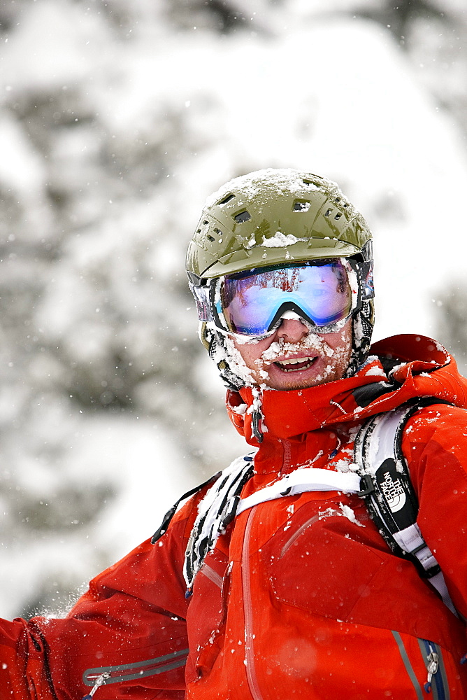 A professional big mountain skier, catches his breath after falling in fresh powder in the Jackson Hole Mountain Resort backcountry, Wyoming.