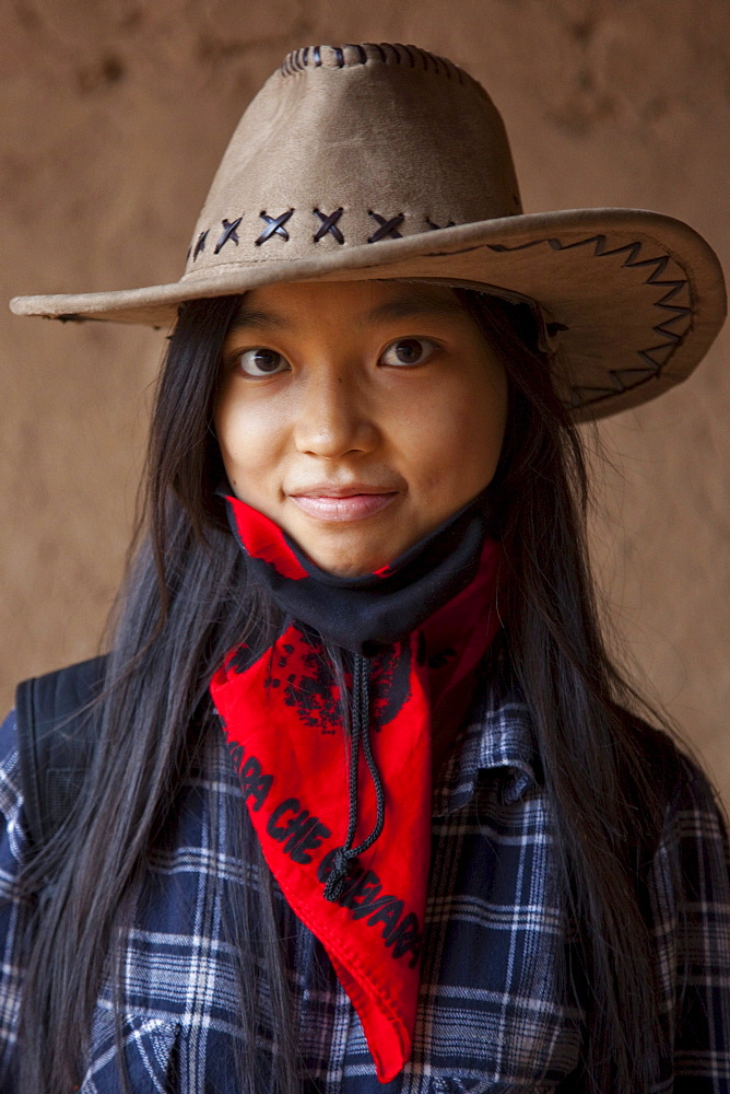 Portrait of a teenage girl in Toyuq, Xinjiang, China.