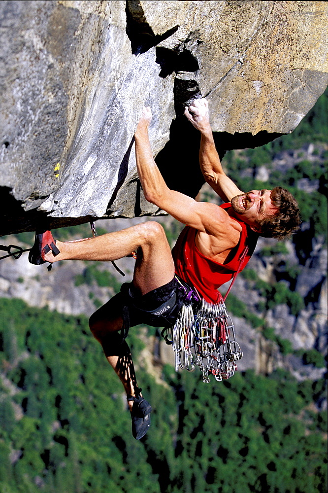 Tim O'Neil climbing on Rostrum 5.12 in Yosemite National Park, California.