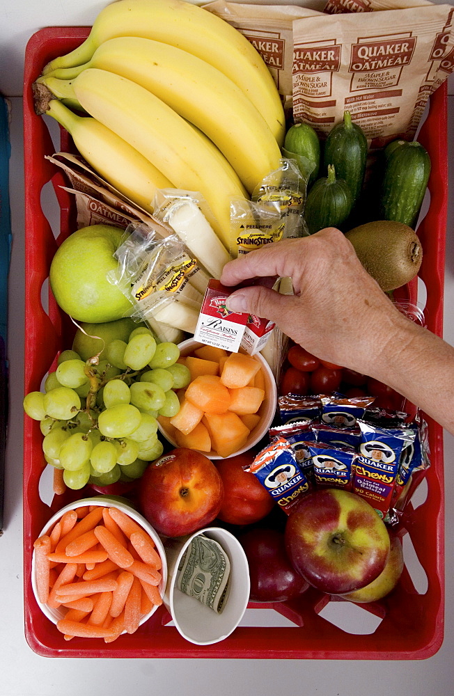 Healthy snacks are available for employees in the kitchen of The Bangor Letter Shop. The Bangor, Maine company won the "Bronze Award" in 2004 in the Wellness Councils of America's contest held every three years.  Bangor Letter Shop President Irv Marsters believes they have a shot at the Gold in 2007.