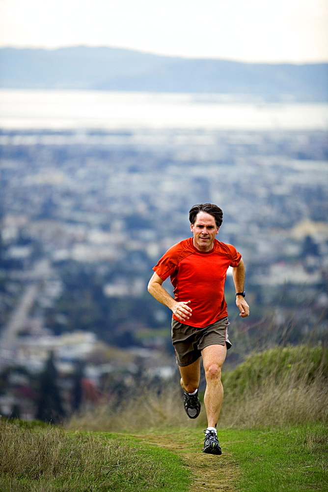 Jeff Rogers trail running in the East Bay Hills above Berkeley and Oakland, California.