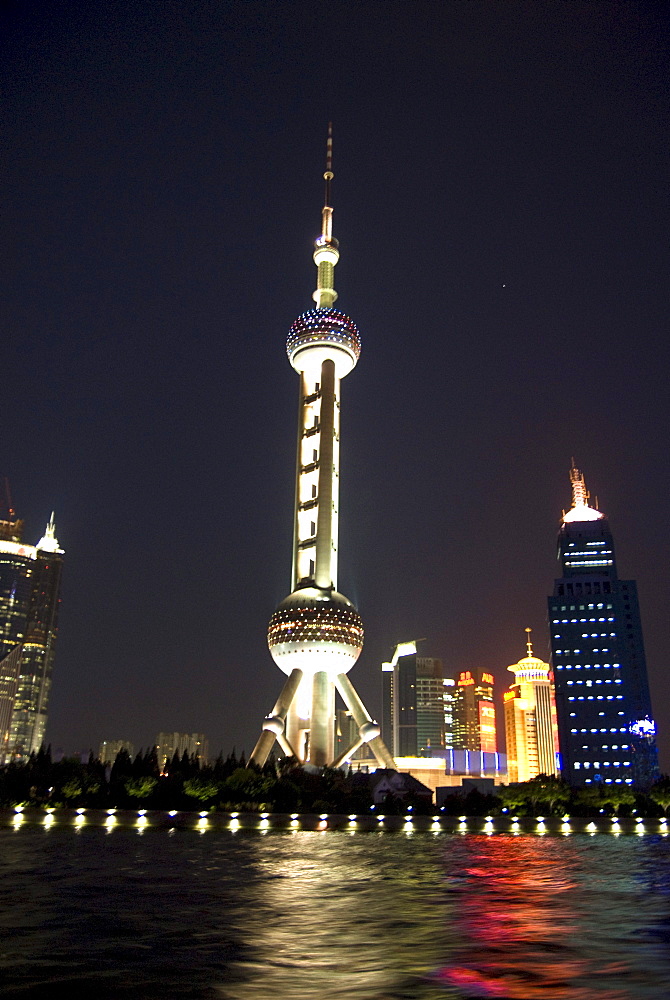 CHINA/Shanghai/Pudong/August 2007:View of Oriental Pearl Tower in Pudong district, from ferry on Huangpu River.