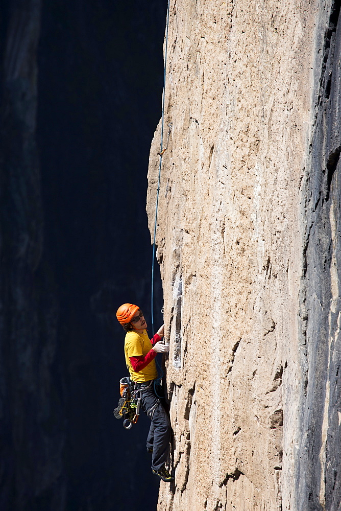 A man climbs to the top of one of the big wall routes in Basaseachic waterfalls in Chihuahua, Mexico